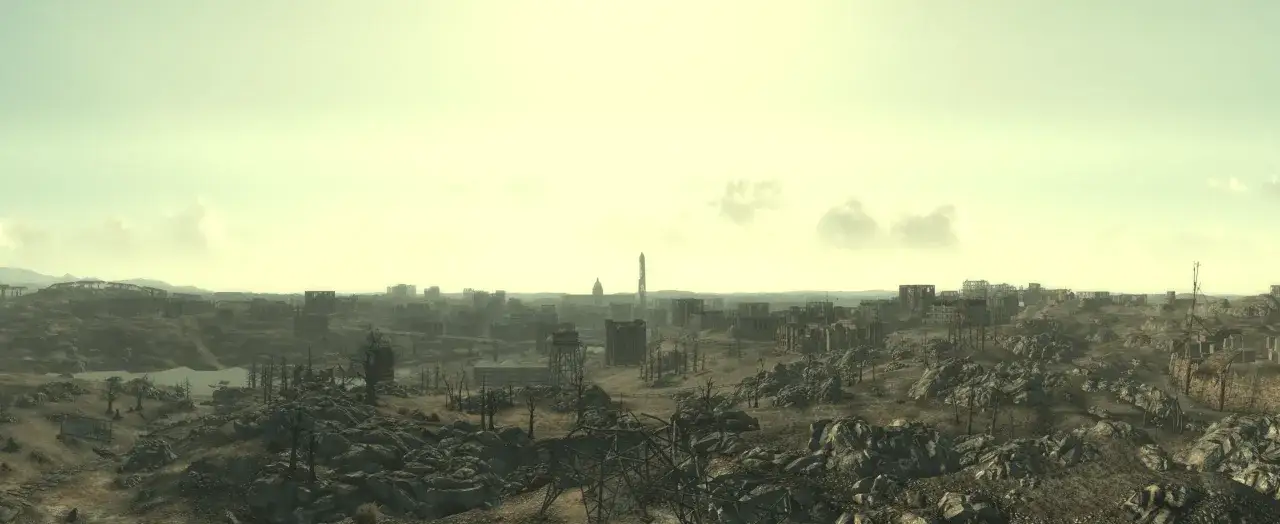 Paisaje desolado de una ciudad en ruinas, con edificios destrozados y vegetación escasa. El cielo es de un tono amarillento, sugiriendo un ambiente post-apocalíptico, como en un fallout 3 remaster.
