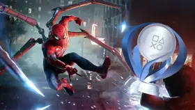 Spider-Man en acción, con sus tentáculos mecánicos desplegados, junto al trofeo platino de Spider-Man 2.
